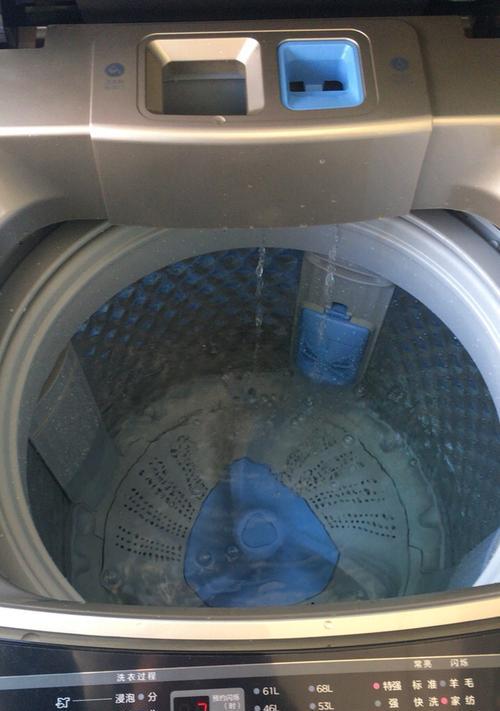 如何修理洗衣机无法彻底清洗水的问题（洗衣机拖不干净水的修理方法及注意事项）