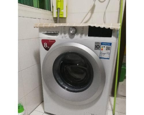 解决LG洗衣机自动进水不停的方法（处理洗衣机进水不停的实用技巧）