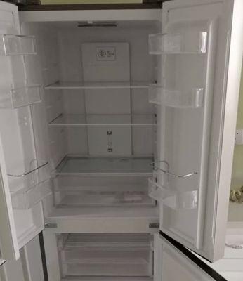 冰箱门太紧怎么办（让冰箱门轻松开合的小技巧）