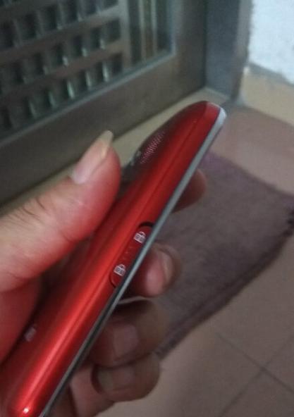 手机拍照时如何消除红色按键条？