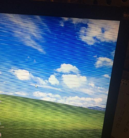电脑图标出现黑条闪烁是为什么？